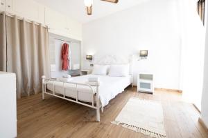 Posteľ alebo postele v izbe v ubytovaní Villa Del Greco