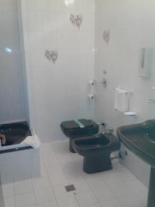 Koupelna v ubytování Hotel Niki