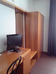 TV a/nebo společenská místnost v ubytování Hotel Niki