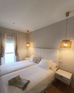 Posteľ alebo postele v izbe v ubytovaní Hotel Posada del Mar