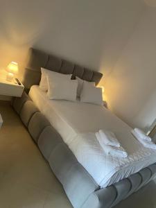 Ένα ή περισσότερα κρεβάτια σε δωμάτιο στο Hotel Mane