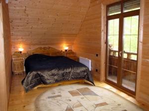 Postel nebo postele na pokoji v ubytování Kazkova Sadyba