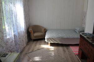 Katil atau katil-katil dalam bilik di Paju Talo kodumajutus Setomaal