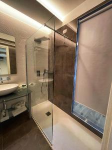Een badkamer bij Park Hotel Cellini