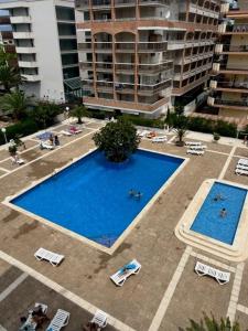 The swimming pool at or close to COSTA DAURADA APARTAMENTS CENTER