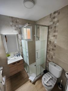 Kúpeľňa v ubytovaní Casa Aigua Blanca Oliva