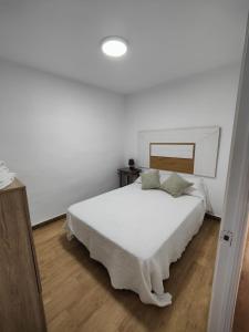 Posteľ alebo postele v izbe v ubytovaní Casa Aigua Blanca Oliva