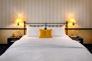 Voodi või voodid majutusasutuse Opera Hotel Zürich toas