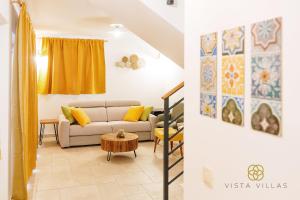 a living room with a couch and a table at Vista Villas - Sunny Pleasure Apartment Villa W in Ražanac