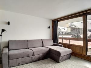 Appartement Les Menuires, 2 pièces, 5 personnes - FR-1-344-595にあるシーティングエリア