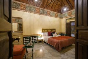 Posteľ alebo postele v izbe v ubytovaní La casa del Cipres una casa con historia