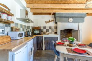 Kuchyňa alebo kuchynka v ubytovaní Ty Armor - Jolie Maison avec Jardinet + 6 fotografií