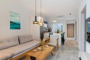 Χώρος καθιστικού στο City and Sand Suites +42 φωτογραφίες