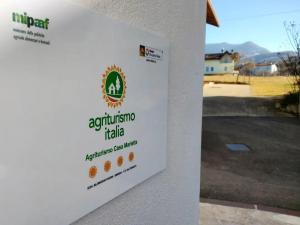 a sign on the side of a house that reads agriculture help at Agriturismo Casa Marietta in Tremea +3 photos