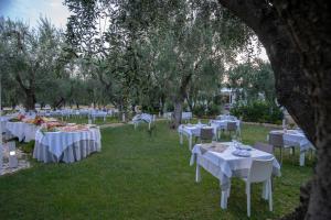 A garden outside Holiday Apartment orchidea with swimming pool and private beach -3