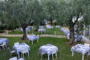 A garden outside Holiday Apartment orchidea with swimming pool and private beach -3