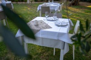 A garden outside Holiday Apartment orchidea with swimming pool and private beach -3