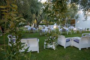 A garden outside Holiday Apartment orchidea with swimming pool and private beach -3