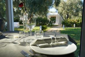 A garden outside Holiday Apartment orchidea with swimming pool and private beach -3