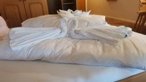 Postel nebo postele na pokoji v ubytování Hotel Dernbachtal