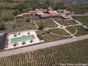 an aerial view of a large estate with a tennis court at Estancia Colome in Molinos