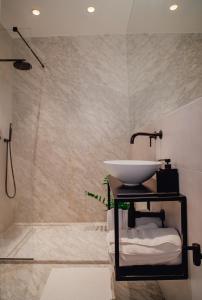 Kylpyhuone majoituspaikassa Santa Margerita Palazzino Apartment