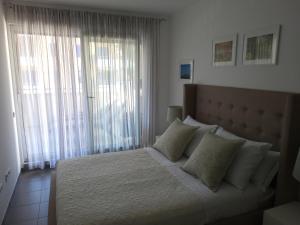 Postel nebo postele na pokoji v ubytování Apartment Kiara