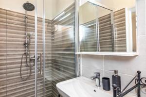 a bathroom with a shower and a sink at Apartments Mario 2 in Pula +28 photos