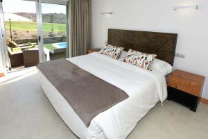 Posteľ alebo postele v izbe v ubytovaní Salobre Vista Golf 23 + 16 fotografií