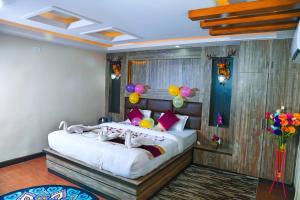 Rúm í herbergi á Hotel Airport Deepshree