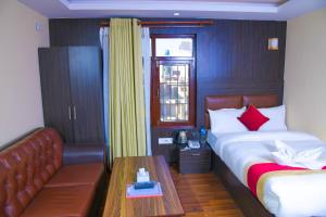 Postel nebo postele na pokoji v ubytování Hotel Airport Deepshree + 37 fotografií