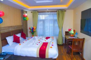 Rúm í herbergi á Hotel Airport Deepshree