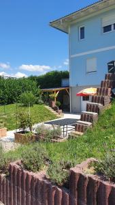 Zahrada ubytování Maison d'hôtes Bleu Cudrefin