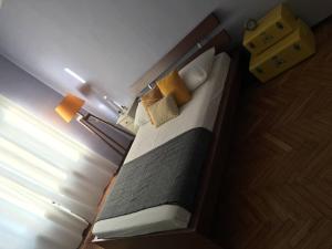 En eller flere senge i et værelse på Pop Apartment near Pala Alpitour