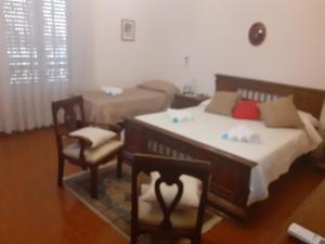 Postel nebo postele na pokoji v ubytování Casa Vacanza I principini