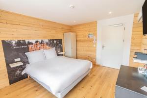 Voodi või voodid majutusasutuse Esplanade Hotel toas