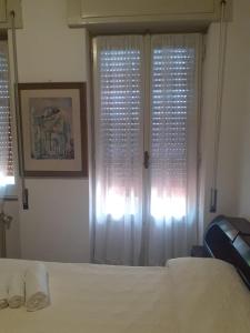 Postel nebo postele na pokoji v ubytování Casa Vacanza I principini
