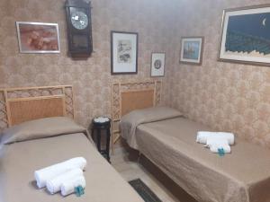 Postel nebo postele na pokoji v ubytování Casa Vacanza I principini