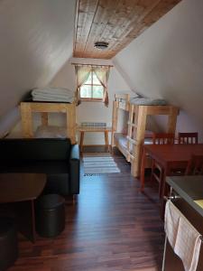 Postel nebo postele na pokoji v ubytování Chatka pod jaskyňou