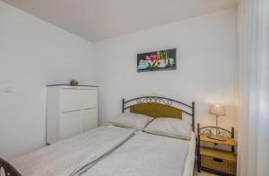 Postel nebo postele na pokoji v ubytování Apartment Tulipan