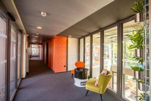 Posezení v ubytování Lorraine Hôtel Nancy Ouest - Laxou
