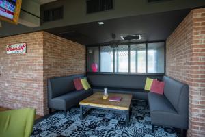 Posezení v ubytování Lorraine Hôtel Nancy Ouest - Laxou
