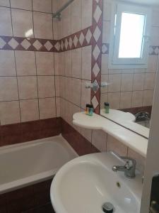 Ένα μπάνιο στο Mavretas Apartments 1