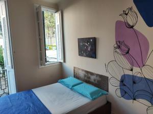 Cama ou camas em um quarto em Lumiar Hostel