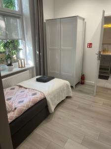Postel nebo postele na pokoji v ubytování Apartamenty u Ewy - EUROS