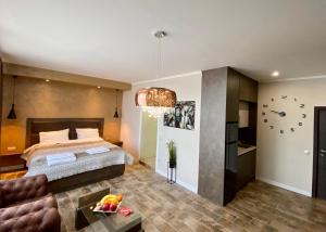 Giường trong phòng chung tại Luxury Apartments Ivon