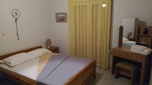 Postel nebo postele na pokoji v ubytování Palm Villa