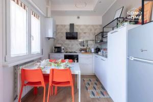 Kuchyňa alebo kuchynka v ubytovaní Como Holiday Home Appartamento ideale per famiglie