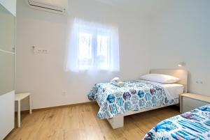 Postel nebo postele na pokoji v ubytování Apartman Placa