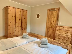 Postel nebo postele na pokoji v ubytování Ferienwohnung 5 im Böhler Haubarg